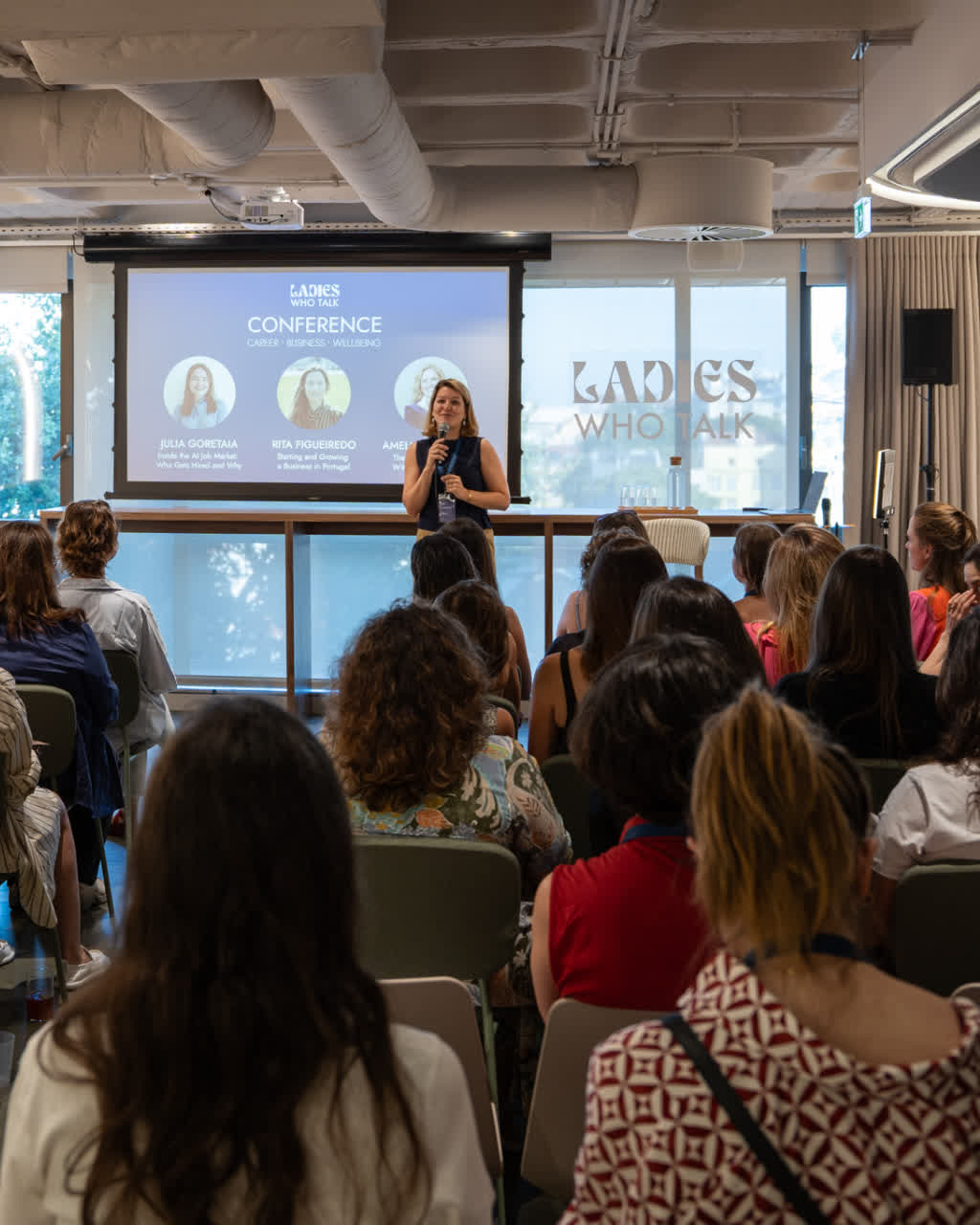 Irina hosting the Ladies Who Talk conference