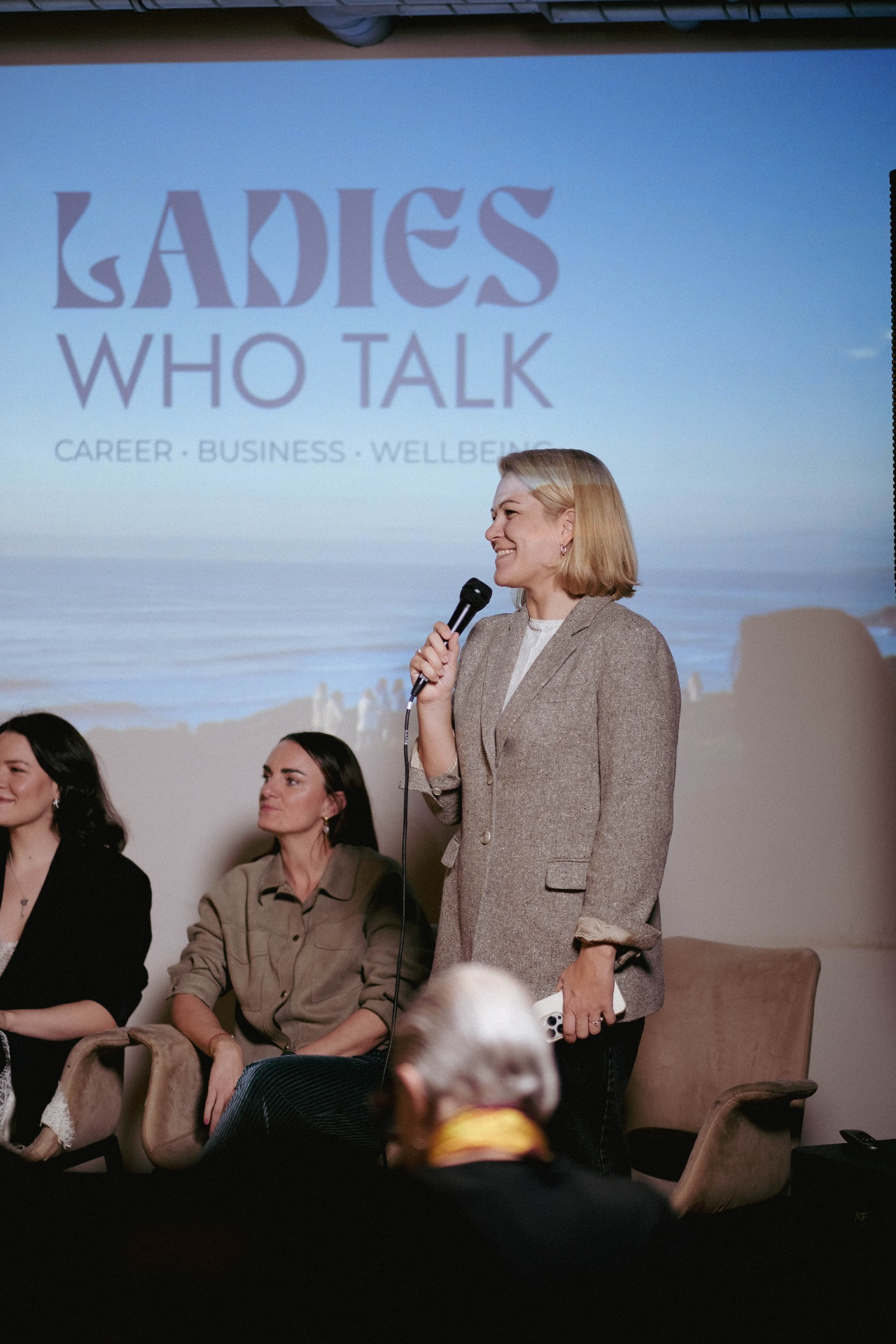 Irina speaking on stage